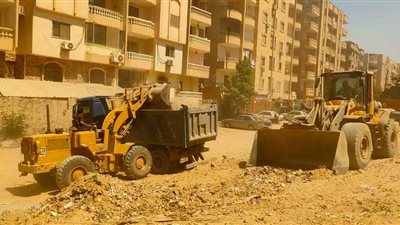 رفع 500 طن مخلفات من أراضي بمنطقة هضبة الأهرام