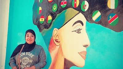 قصة فتاة زينت استاد الإسكندرية استعدادًا لاستقبال الأمم الإفريقية فتم وقفها عن العمل (صور)