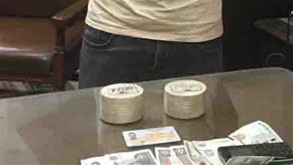 المتهم بحوزة المضبوطات