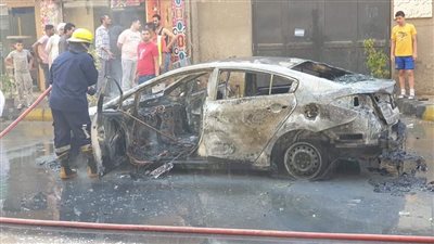 تفحم سيارة كيا بشارع العشرين بالجيزة «صور»