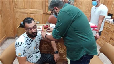 تطعيم شعب كنيسة الأنبا بيشوي ببورسعيد بالجرعة الثانية من لقاح كورونا | صور