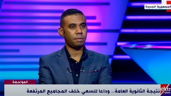 الكاتب الصحفي محمود