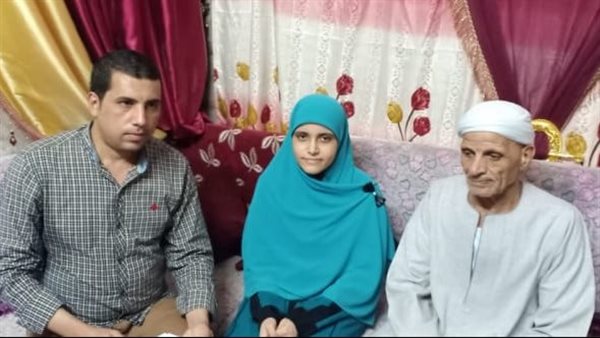 الطالبة ووالدها 