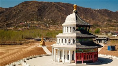 كنيسة على شكل كمان ومبنى على هيئة بيضة.. مسابقة لأقبح المباني الصينية │ صور