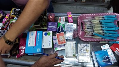 ضبط سرنجات معبأة بمادة مجهولة في إحدى الصيدليات ببورسعيد | صور