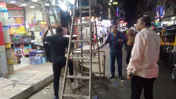 رفع اشغالات بحي وسط