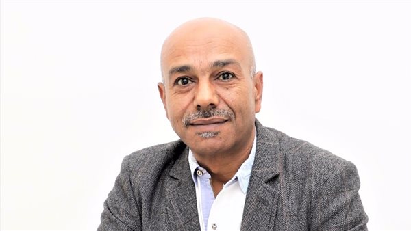 الشاعر علي العامري