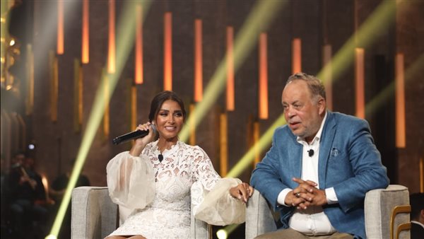 أشرف زكي وروجينا