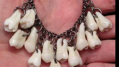 صاحب صورة قلادة الأسنان لـ القاهرة 24: الموضوع هزار وفوتوشوب والناس صدقت