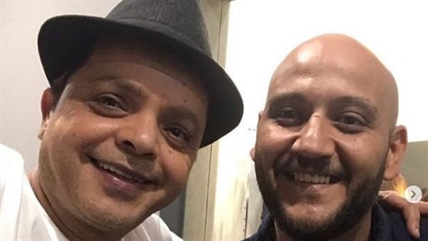 محمد هنيدي وأحد المنظمين