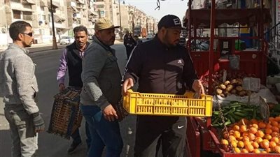 حمله لإزالة الإشغالات والتعديات بشارع 23 ديسمبر ببورسعيد | صور