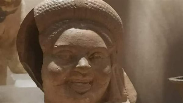 لمسرجة على شكل وجه