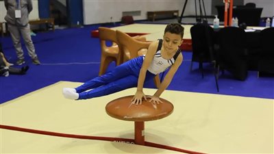 بعدما رفضته الأندية.. آدم فوزي يتوج بذهبية كأس مصر للجمباز