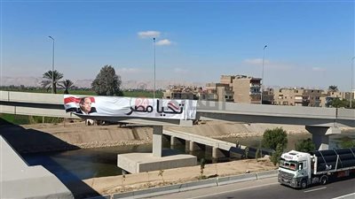قبل افتتاحه.. لافتات تحيا مصر تزين محور الشهيد باسم فكري في قنا | صور