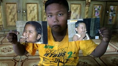 أصغر مدخن في العالم.. من 40 سيجارة يوميا إلى الإقلاع وتغيير روتين حياته | صور 