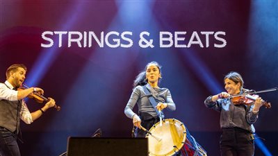 فرقة سترينغز أند بيتس تجمع ثقافات العالم في حفل موسيقي بإكسبو | صور