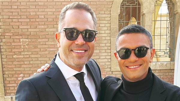 مصطفى درويش وآسر