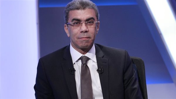 الصحفي ياسر رزق 