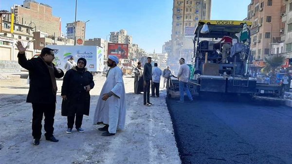 أعمال الرصف بشارع