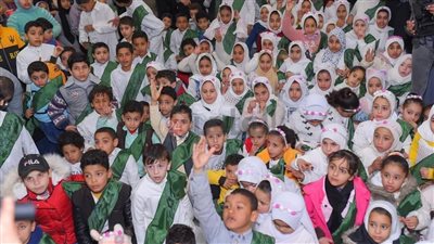 وشاح أخضر وزي موحد.. قرية بالغربية تحتفل بـ120 طفلا من حفظة القرآن الكريم 