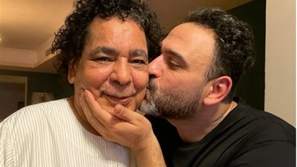 أكرم حسني ومحمد منير