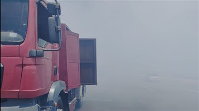 إعادة فتح محور 30 يونيو ببورسعيد بعد سيطرة الحماية المدنية عل حريق نشب في هيش | صور