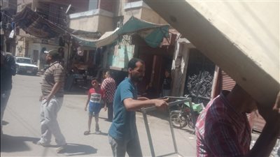 حملة مكبرة لرفع الإشغالات والحواجز الأسمنتية بعدة مناطق في أسيوط