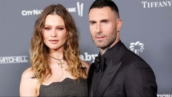  أدم ليفين وزوجته