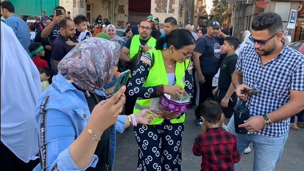 توزيع حلوي المولد