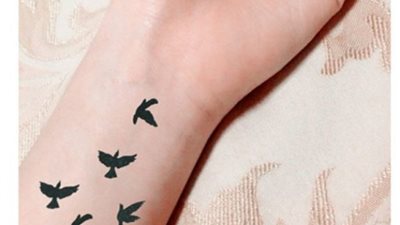 الإسلام شرع التجمل.. دار الإفتاء: رسم التاتو للمرأة جائز