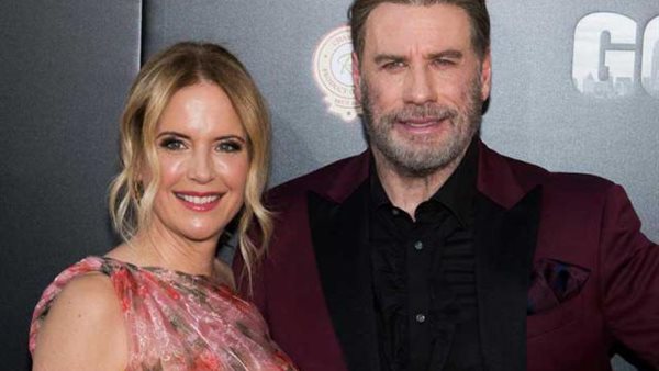 جون ترافولتا وزوجته