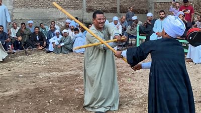 التحطيب.. لعبة متوارثة يحرص عليها أهالي الصعيد في الأفراح والمناسبات السعيدة