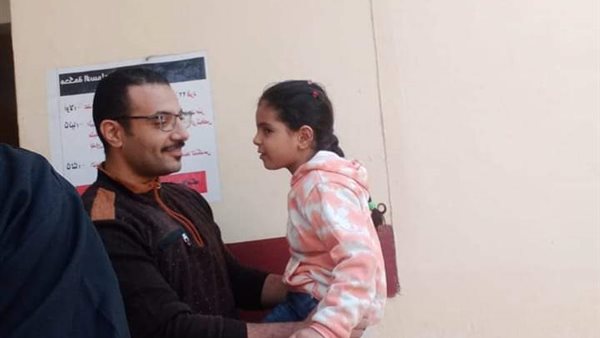 آسيل مع والدها 