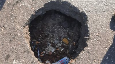 هبوط أرضي بمنتصف شارع صلاح سالم بالوايلي 