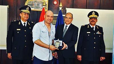 أكاديمية الشرطة تكرم الشاعر الغنائي خالد تاج الدين في عيدها الـ68 (صورة)