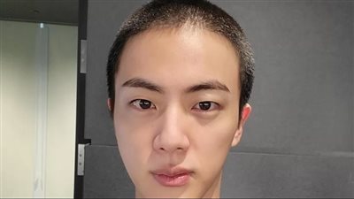 تفاصيل التحاق جين عضو فرقة BTS بالجيش الكوري في الصفوف الأمامية
