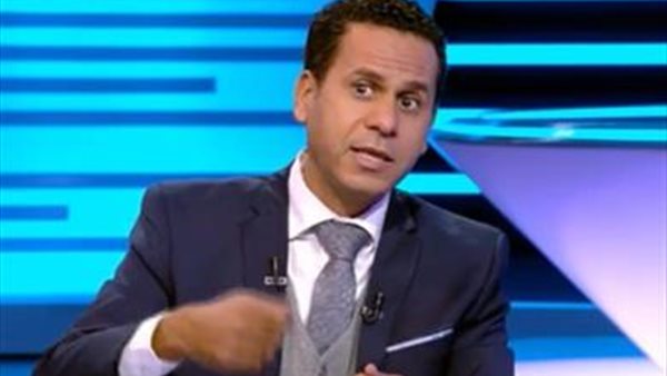  الكاتب الصحفي محمود