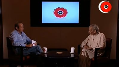 حوار يجمع ساويرس والفاجومي يرد على اتهام الشاعر الكبير بـ الارتزاق والبيع