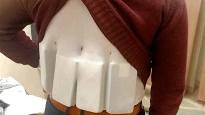 جمارك مطار القاهرة تضبط راكبا حاول تهريب 12 هاتف آيفون تحت ملابسه