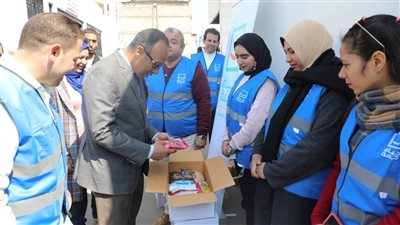 حياة كريمة بالمنيا توزع 4 آلاف كرتونة مواد غذائية بقرية المعصرة 