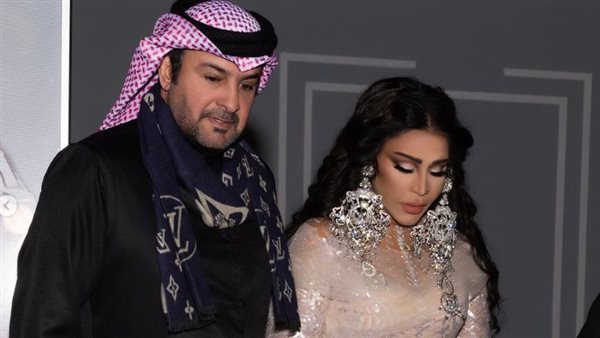 أحلام وزوجها 