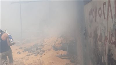 انتداب فريق من المعمل الجنائي لبيان سبب حريق مخزن خردة بالجيزة